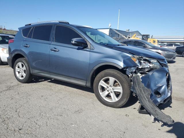 Photo 4 from auction – 2014 TOYOTA RAV4 XLE with VIN JTMWFREV9ED026890