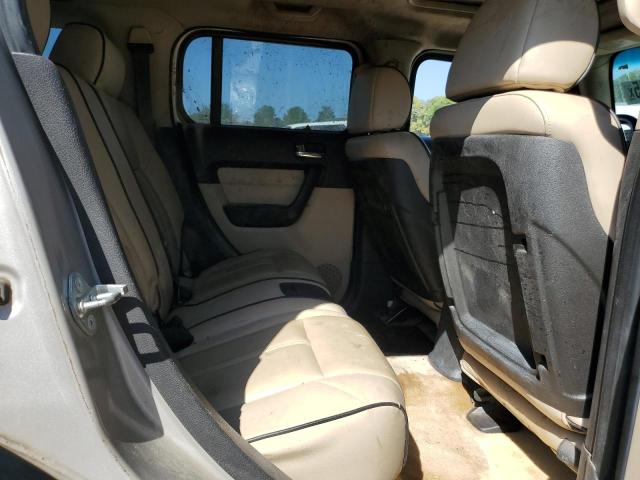 Photo 11 from auction – 2006 HUMMER H3 with VIN 5GTDN136168203569