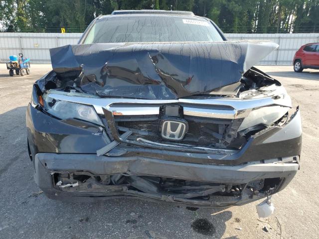 Photo 5 from auction – 2019 HONDA RIDGELINE with VIN 5FPYK3F76KB009624