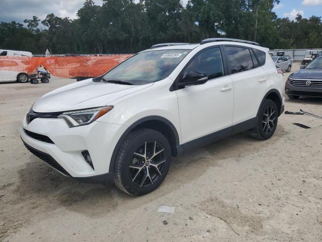 TOYOTA RAV4 SE 2018 with VIN JTMNFREV9JJ176375 - Photo from auction