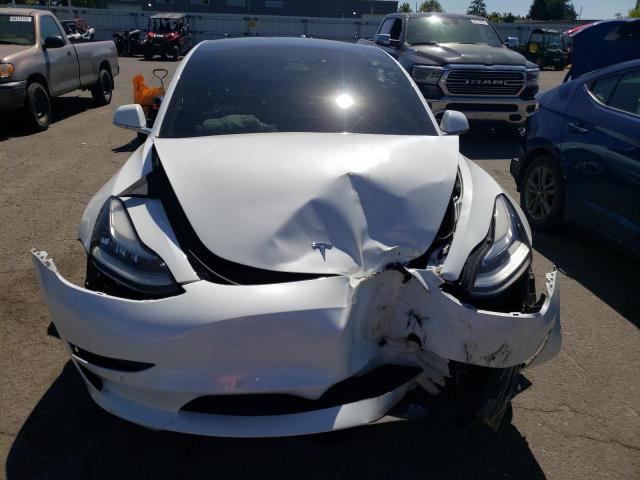 Photo 5 from auction – 2018 TESLA MODEL 3 with VIN 5YJ3E1EA7JF047356
