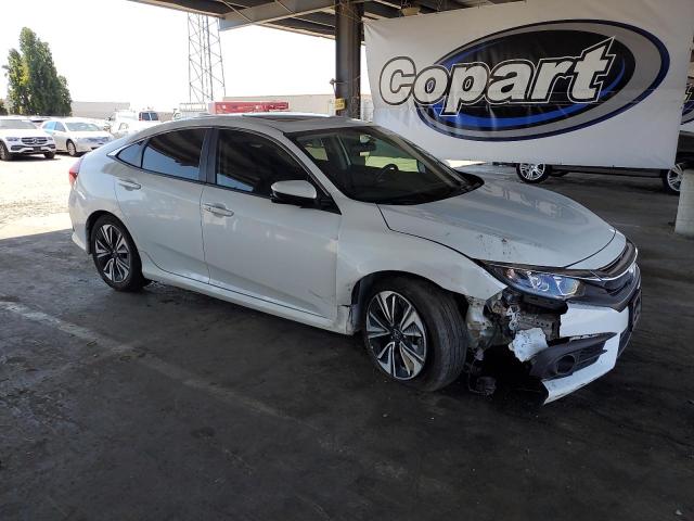 Photo 4 from auction – 2018 HONDA CIVIC EX with VIN JHMFC1F36JX015750