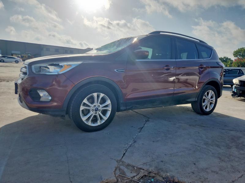 FORD ESCAPE SE 2018 with VIN 1FMCU0GD7JUB27652 - Photo from auction