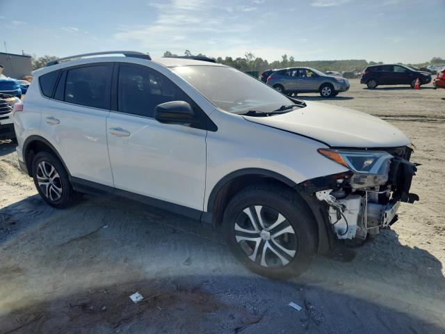 Photo 4 from auction – 2018 TOYOTA RAV4 LE with VIN JTMZFREV1JJ751683
