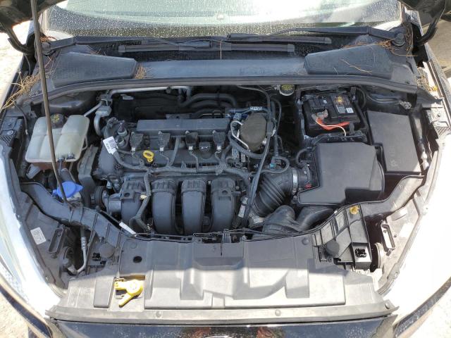 Photo 11 from auction – 2015 FORD FOCUS with VIN 1FADP3F25FL256686