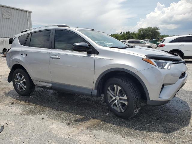 Photo 4 from auction – 2018 TOYOTA RAV4 LE with VIN 2T3ZFREV3JW510452