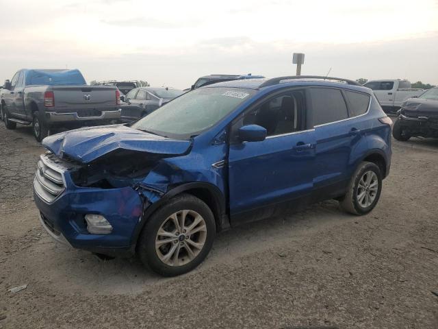 FORD ESCAPE SE 2018 with VIN 1FMCU9GD3JUB70101 - Photo from auction