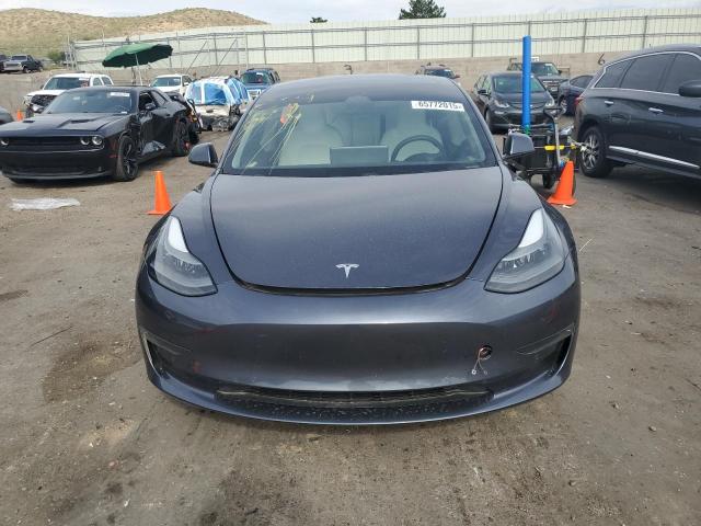 Photo 5 from auction – 2021 TESLA MODEL 3 with VIN 5YJ3E1EA7MF085044