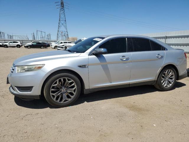 FORD TAURUS LIM 2014 with VIN 1FAHP2F85EG134725 - Photo from auction