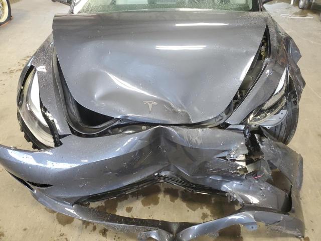 Photo 11 from auction – 2023 TESLA MODEL 3 with VIN 5YJ3E1EA8PF703704