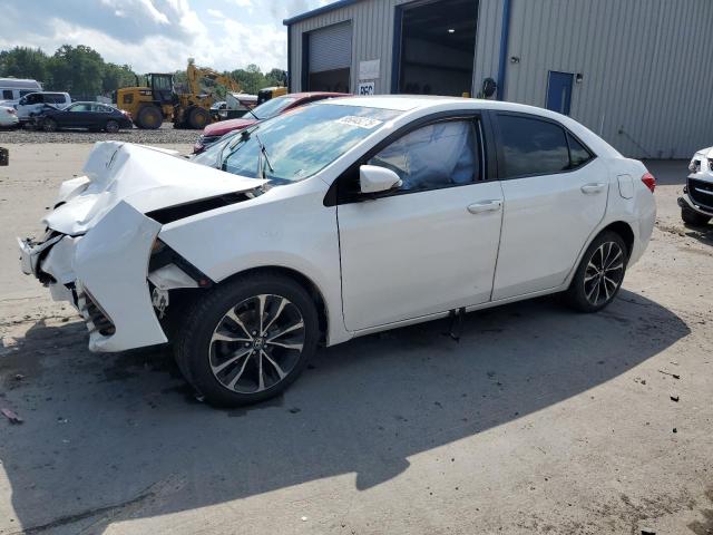 TOYOTA COROLLA 2018 with VIN 2T1BURHE8JC003334 - Photo from auction