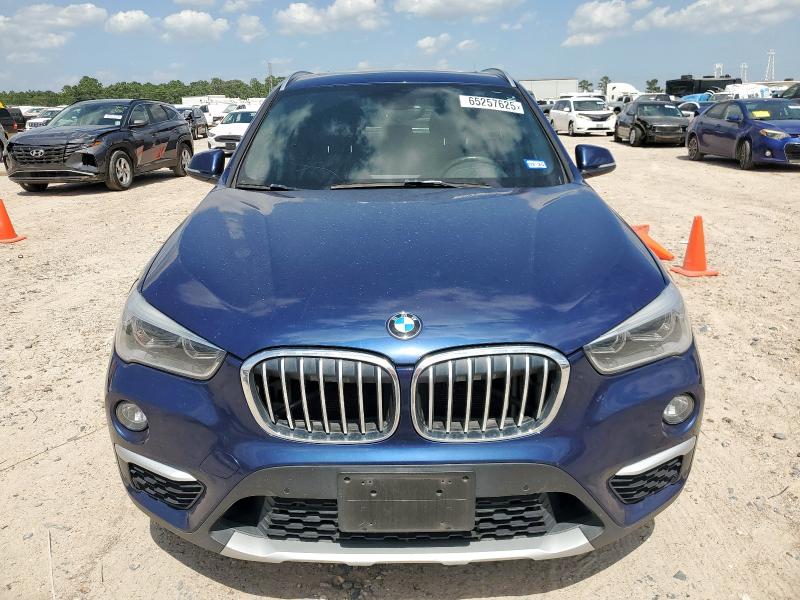 Photo 5 from auction – 2016 BMW X1 XDRIVE2 with VIN WBXHT3C3XG5F66350
