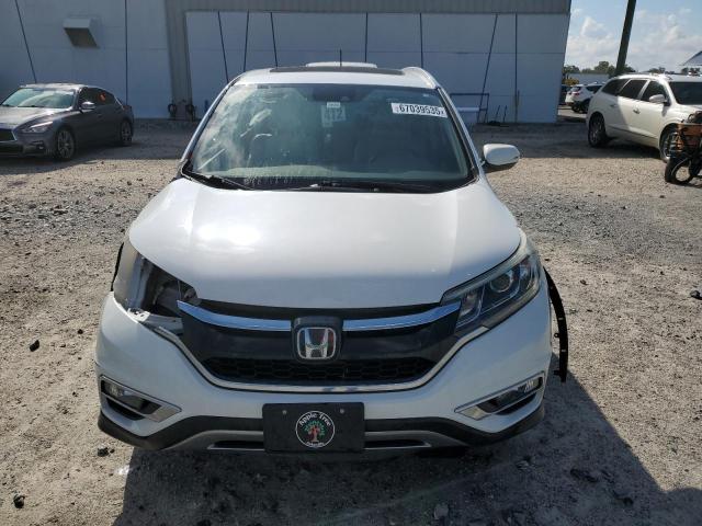 Photo 5 from auction – 2016 HONDA CR-V TOURI with VIN 5J6RM4H91GL014529