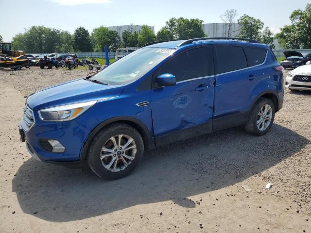 FORD ESCAPE SE 2018 with VIN 1FMCU9GD8JUC25299 - Photo from auction