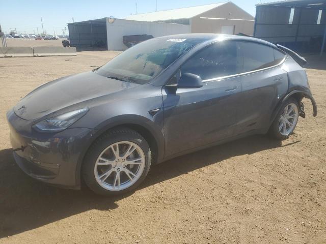 TESLA MODEL Y 2022 with VIN 7SAYGDEE7NA008860 - Photo from auction