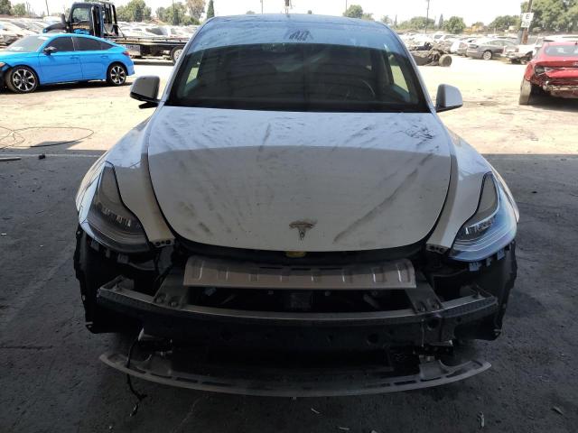 Photo 5 from auction – 2021 TESLA MODEL Y with VIN 5YJYGDEE8MF074719