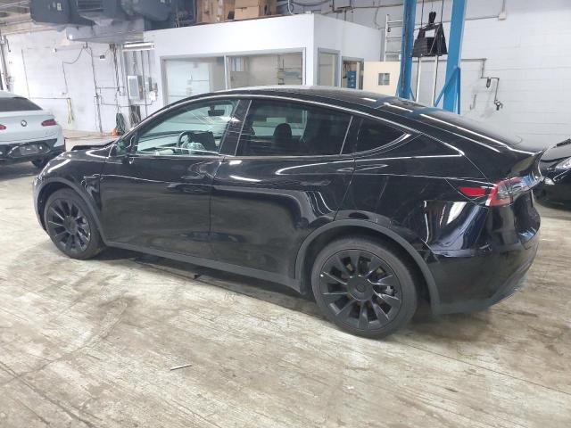 Photo 2 from auction – 2023 TESLA MODEL Y with VIN 7SAYGDEE4PA042256