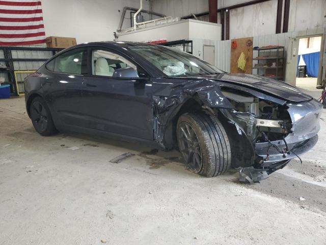 Photo 4 from auction – 2021 TESLA MODEL 3 with VIN 5YJ3E1EB2MF974231