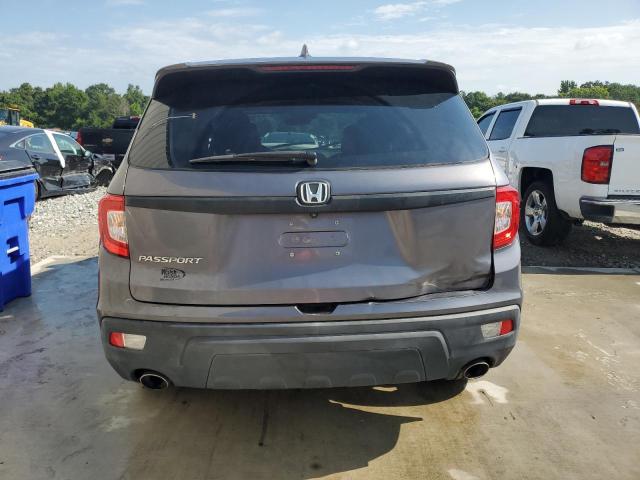 Photo 6 from auction – 2021 HONDA PASSPORT E with VIN 5FNYF7H50MB011873