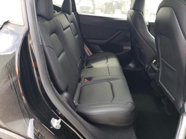 Photo 10 from auction – 2023 TESLA MODEL Y with VIN 7SAYGDEE8PF928261