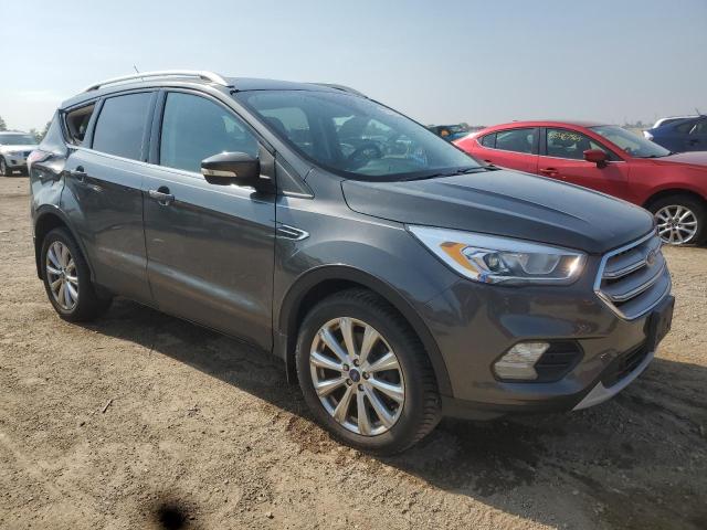 Photo 4 from auction – 2017 FORD ESCAPE TIT with VIN 1FMCU9J98HUA58537