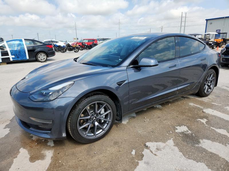 TESLA MODEL 3 2023 with VIN 5YJ3E1EA9PF429090 - Photo from auction