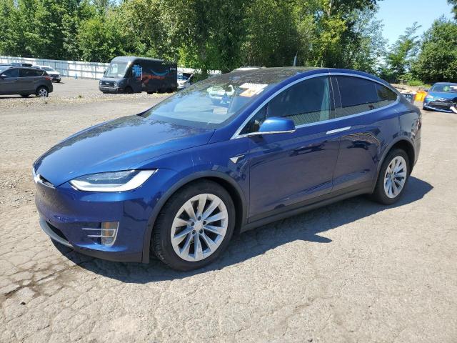 TESLA MODEL X 2017 with VIN 5YJXCBE29HF037184 - Photo from auction