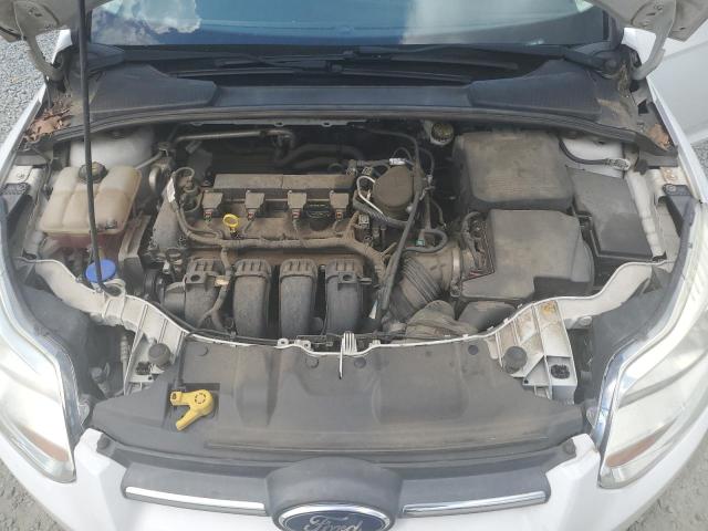 Photo 11 from auction – 2014 FORD FOCUS SE with VIN 1FADP3F23EL103464