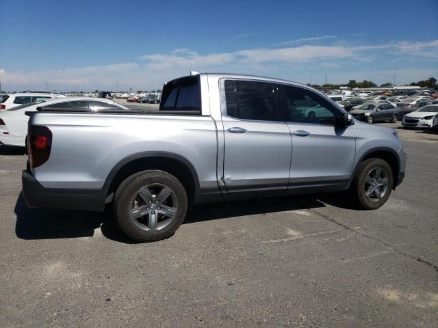 Photo 3 from auction – 2023 HONDA RIDGELINE with VIN 5FPYK3F76PB035180