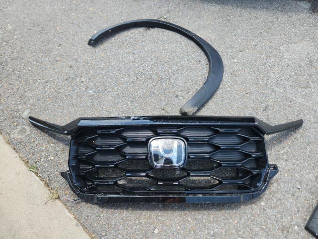 Photo 13 from auction – 2023 HONDA PASSPORT E with VIN 5FNYF8H05PB037156