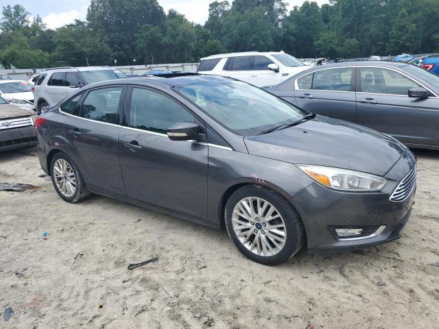 Photo 4 from auction – 2015 FORD FOCUS TITA with VIN 1FADP3J21FL360776