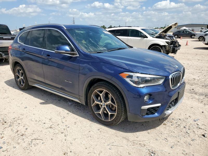 Photo 4 from auction – 2016 BMW X1 XDRIVE2 with VIN WBXHT3C3XG5F66350