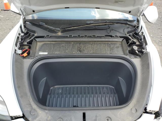 Снимка 12 от търг – 2022 TESLA MODEL Y с VIN 7SAYGDEE5NF435411