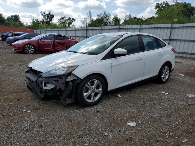 FORD FOCUS SE 2014 with VIN 1FADP3F28EL132992 - Photo from auction