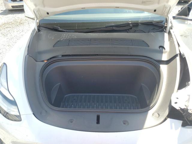 Photo 11 from auction – 2023 TESLA MODEL Y with VIN 7SAYGDEE9PA099570