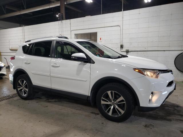 Photo 4 from auction – 2017 TOYOTA RAV4 XLE with VIN JTMRFREV1HJ715647