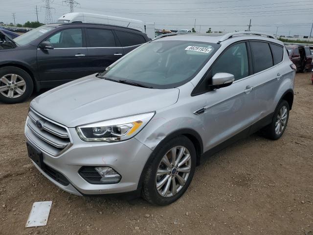 FORD ESCAPE TIT 2017 with VIN 1FMCU0J91HUE66051 - Photo from auction