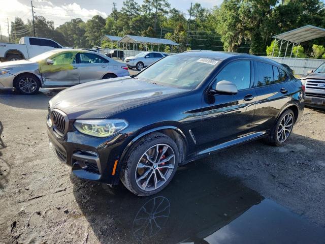 BMW X4 XDRIVEM 2021 with VIN 5UX2V5C05M9F68427 - Photo from auction
