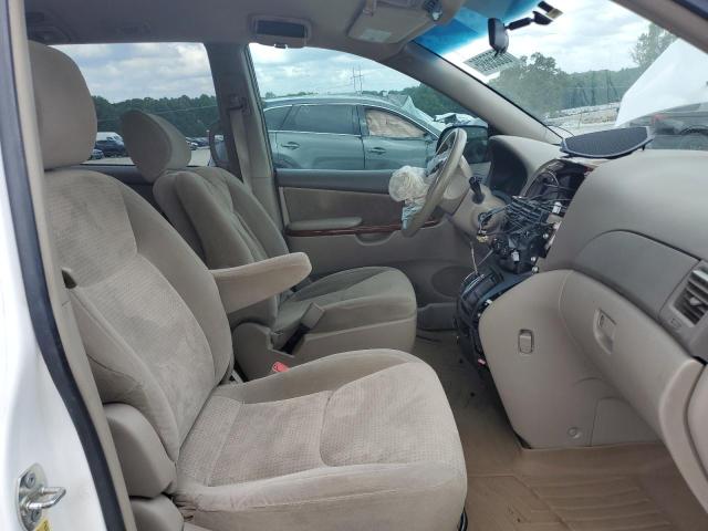 Photo 11 from auction – 2010 TOYOTA SIENNA CE with VIN 5TDKK4CCXAS323549