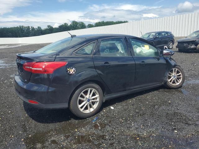 Photo 3 from auction – 2016 FORD FOCUS SE with VIN 1FADP3F28GL257087