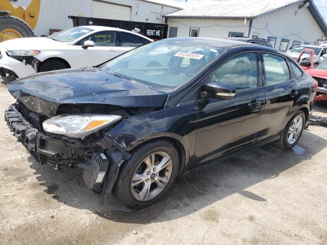 FORD FOCUS SE 2014 with VIN 1FADP3F23EL184322 - Photo from auction