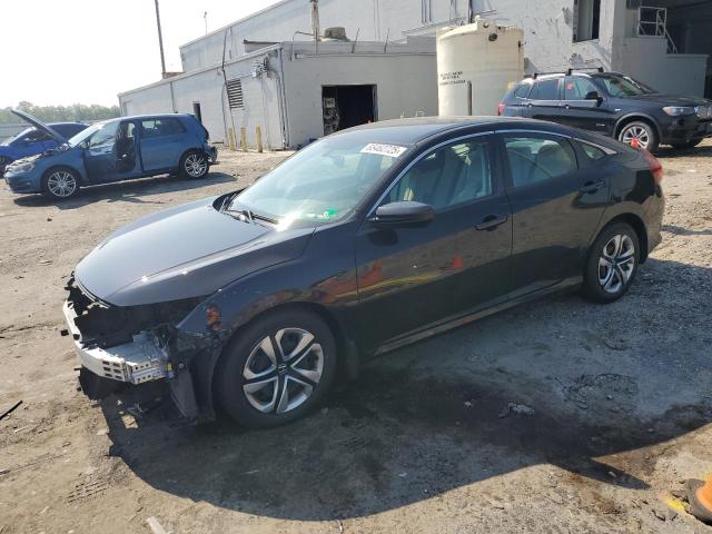 HONDA CIVIC LX 2018 with VIN 2HGFC2F52JH591320 - Photo from auction