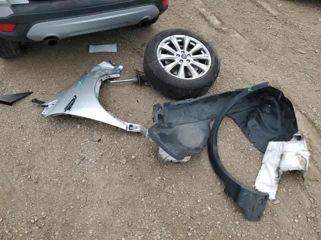 Photo 12 from auction – 2017 FORD ESCAPE TIT with VIN 1FMCU0J91HUE66051