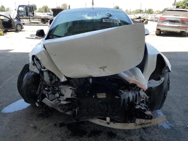 Photo 5 from auction – 2022 TESLA MODEL 3 with VIN 5YJ3E1EB1NF128500