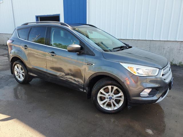 Photo 4 from auction – 2018 FORD ESCAPE SE with VIN 1FMCU9GD4JUA13614