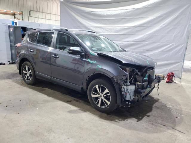 Photo 4 from auction – 2017 TOYOTA RAV4 XLE with VIN 2T3RFREV7HW573175