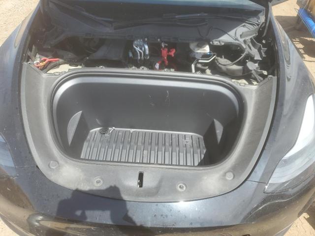 Photo 12 from auction – 2023 TESLA MODEL Y with VIN 7SAYGDEE4PF895002