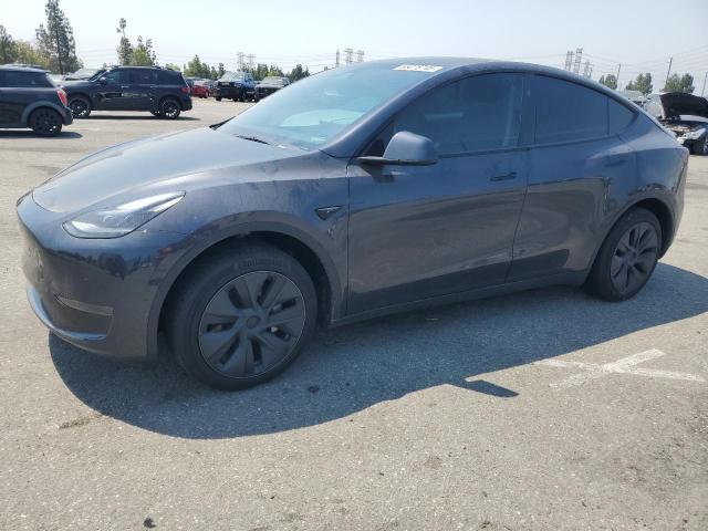 TESLA MODEL Y 2024 with VIN 7SAYGDED0RF124983 - Photo from auction