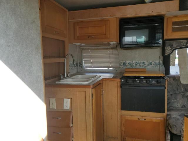 Photo 9 from auction – 2005 FORD ECONOLINE with VIN 1FDXE45S15HA57247