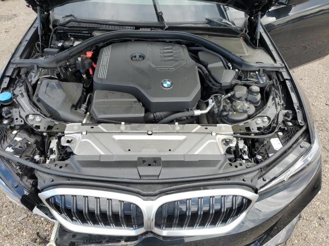 Photo 11 from auction – 2024 BMW 330I with VIN 3MW69FF06R8E53405